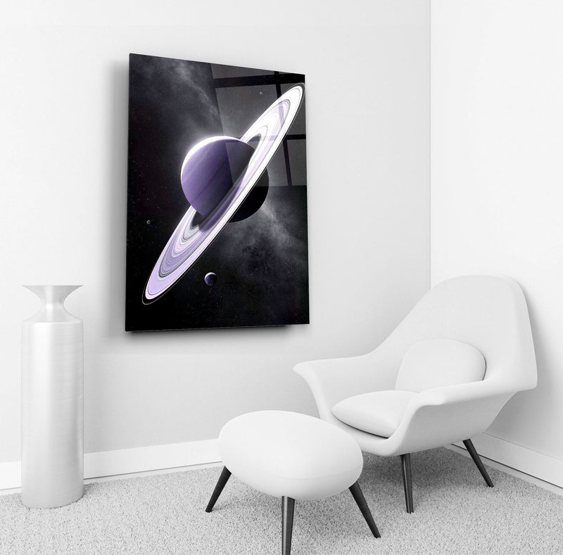 Saturn space glass wall art in a living room