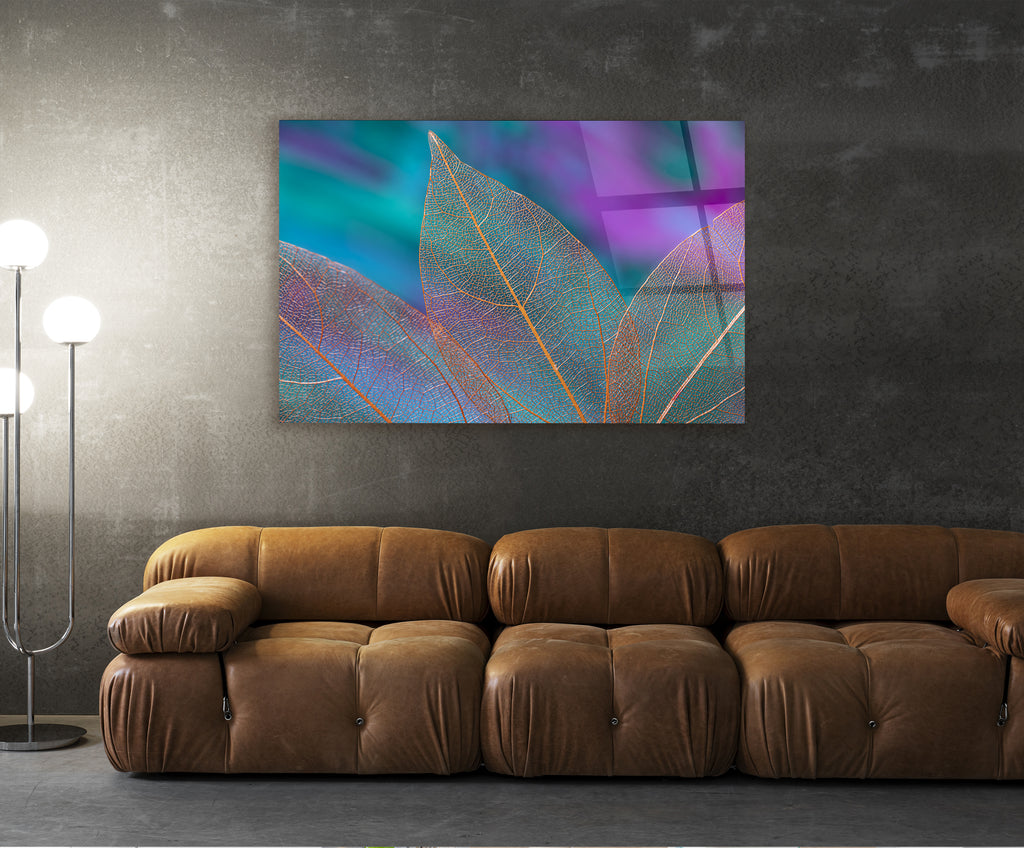 Iridescent Teal Leaves Abstract Glass Wall Art in a living room interior