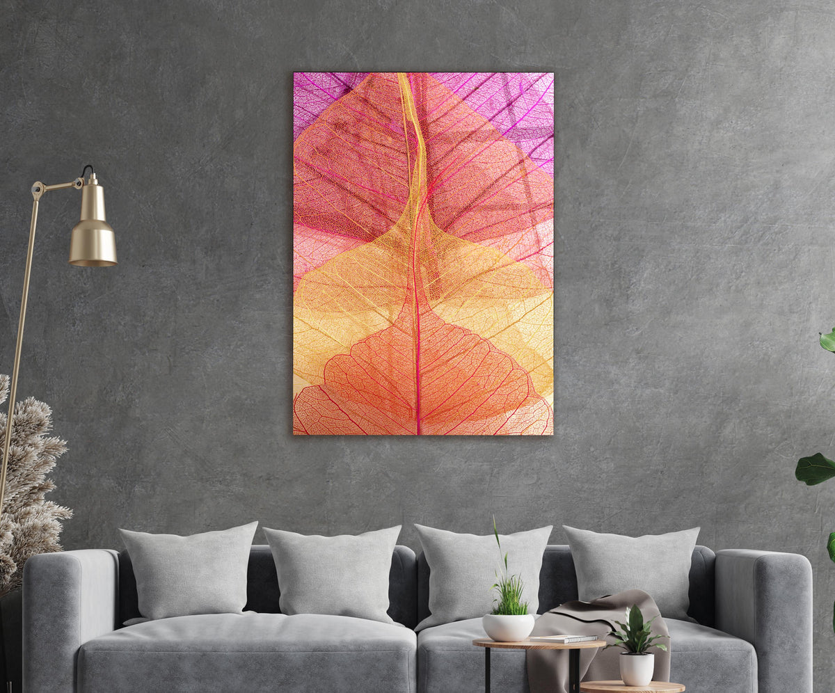 Pink and Orange Leaf Veins Glass Wall Art on the wall