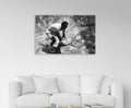 Black and White Tennis Player Glass Wall Art in a living room interior
