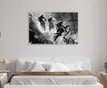 Black and White Motocross Jump Glass Wall Art in a living room interior