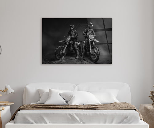 Black and White Motocross Riders Glass Wall Art in a living room interior