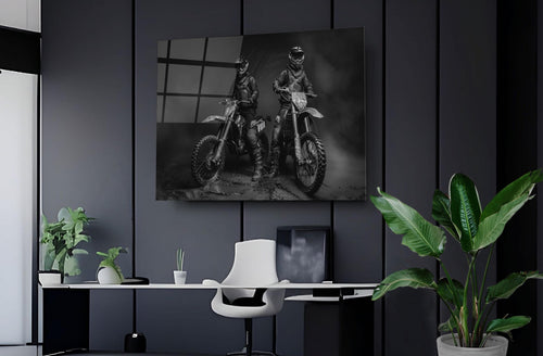 Black and White Motocross Riders Glass Wall Art in a modern interior