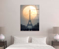 Eiffel Tower Full Moon Glass Wall Art in a living room interior