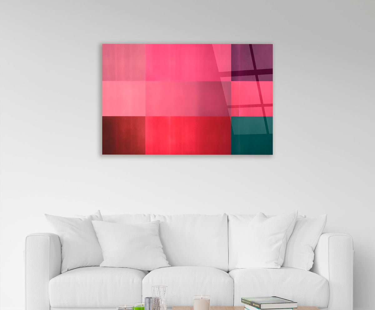 Pink and Crimson Color Block Glass Wall Art in a living room interior