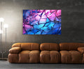 Pink and Blue Cracked Mosaic Abstract Glass Wall Art in a living room interior