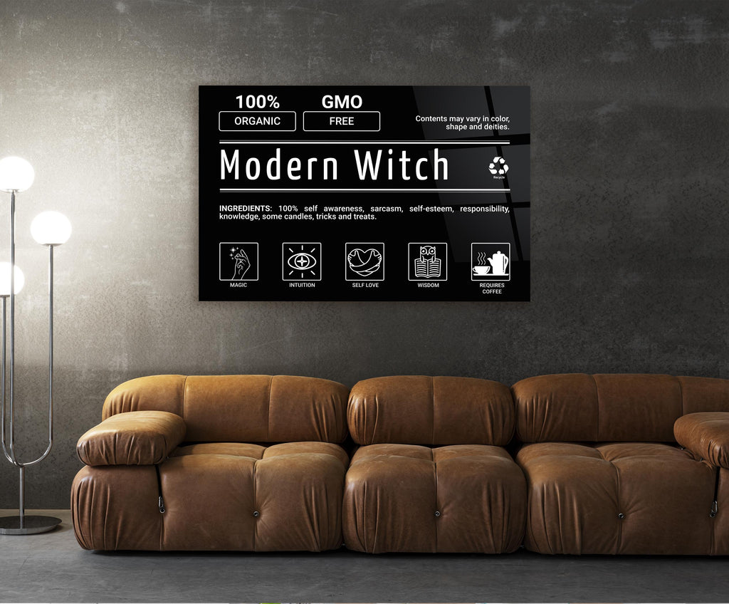 Modern Witch Label Typography Glass Wall Art in a living room interior