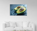 Fresh Avocado Halves Glass Wall Art in a living room interior