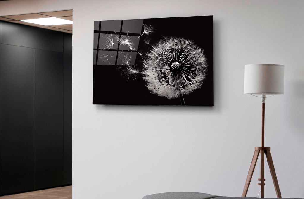 Black and White Dandelion Glass Wall Art on the wall