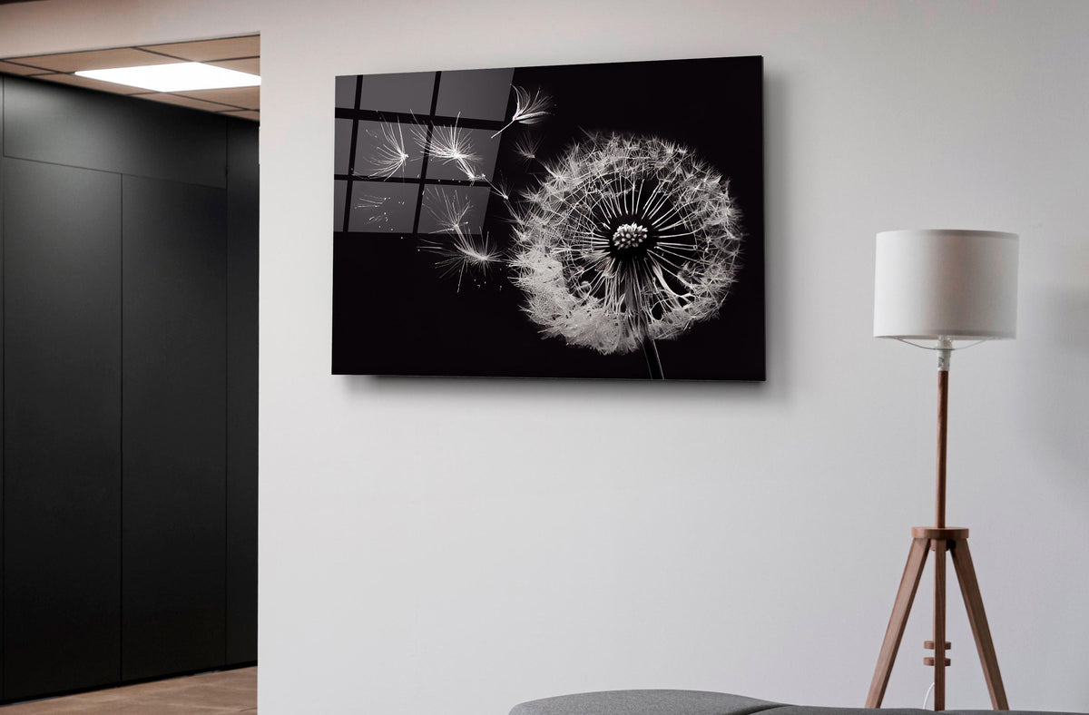 Black and White Dandelion Glass Wall Art on the wall