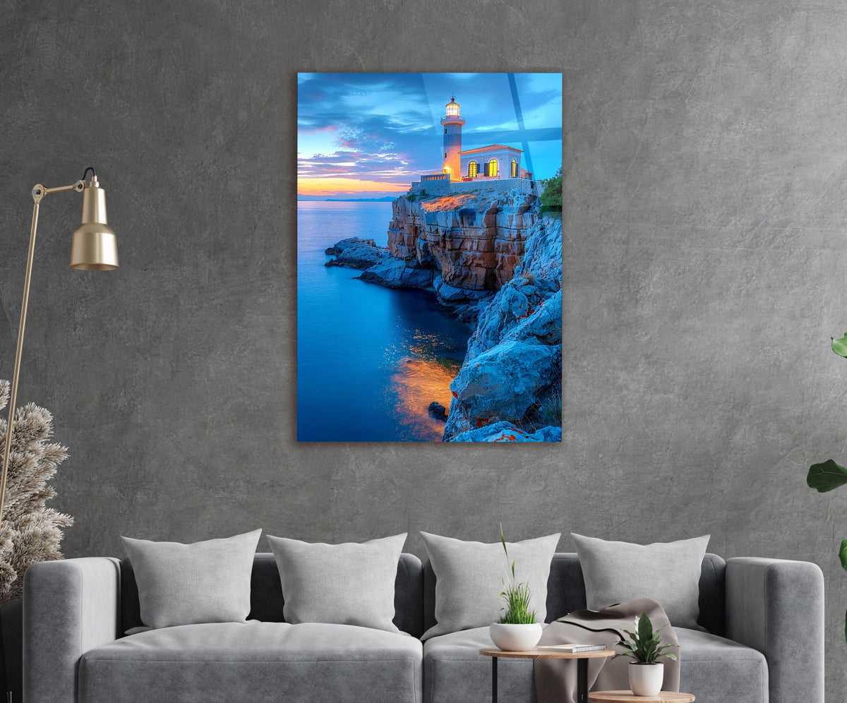 Clifftop Lighthouse at Blue Hour Glass Wall Art in a living room interior
