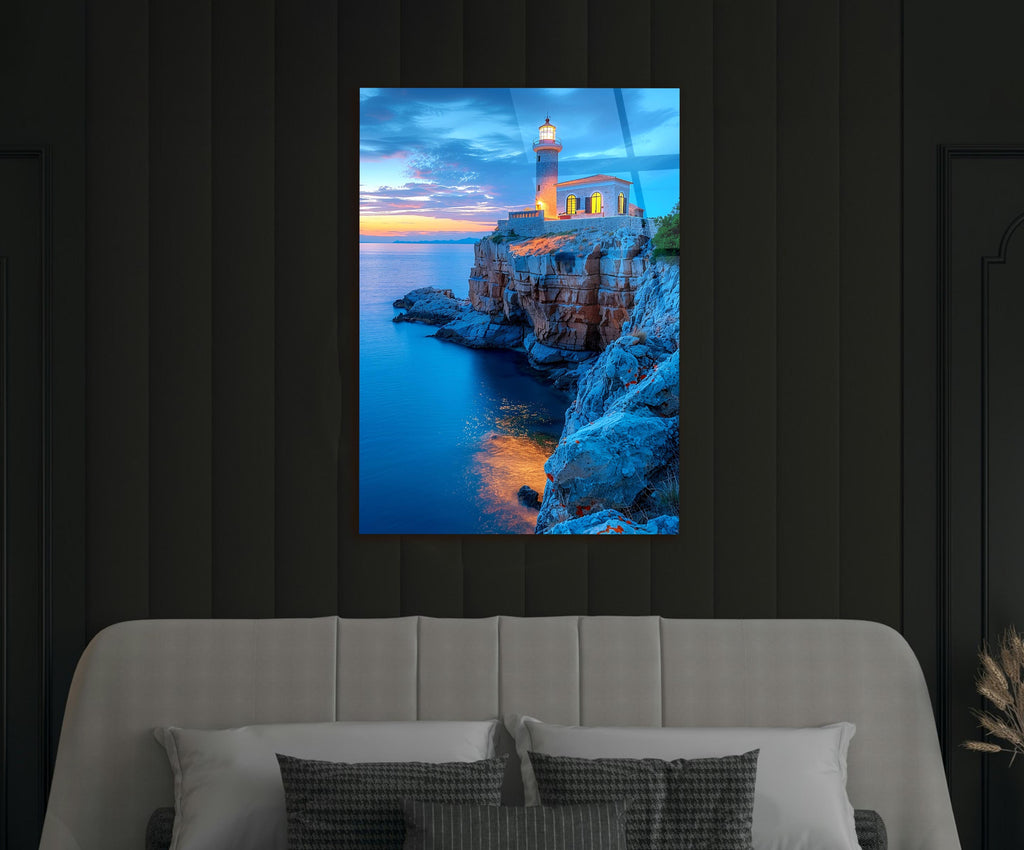 Clifftop Lighthouse at Blue Hour Glass Wall Art in a modern interior