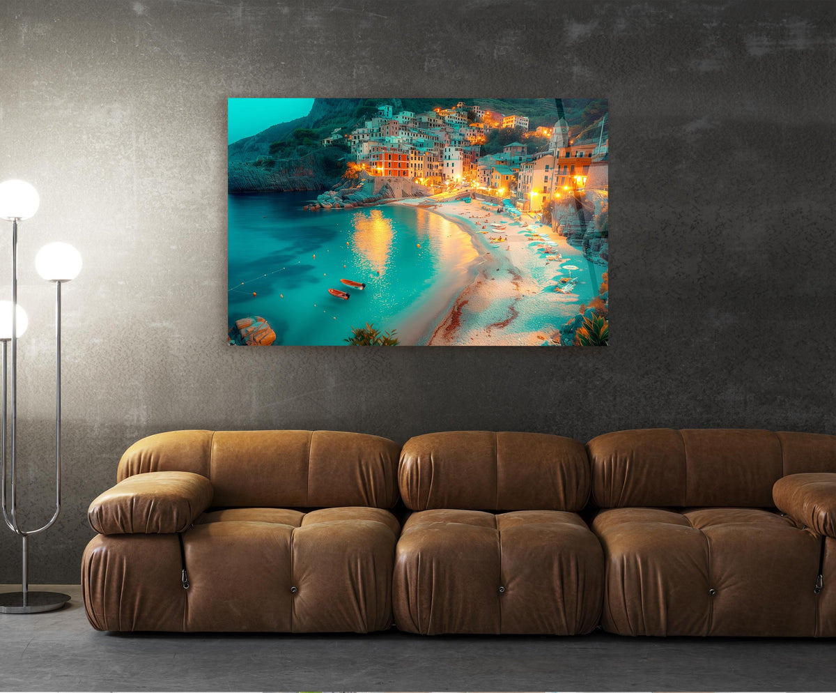 Coastal Village Beach at Dusk Glass Wall Art in a living room interior