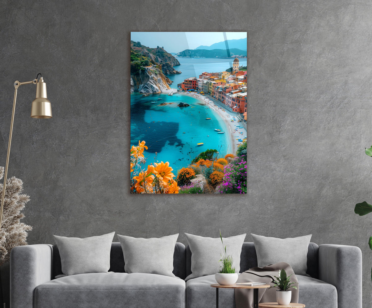 Mediterranean Cliffside Village Bay Glass Wall Art in a living room interior