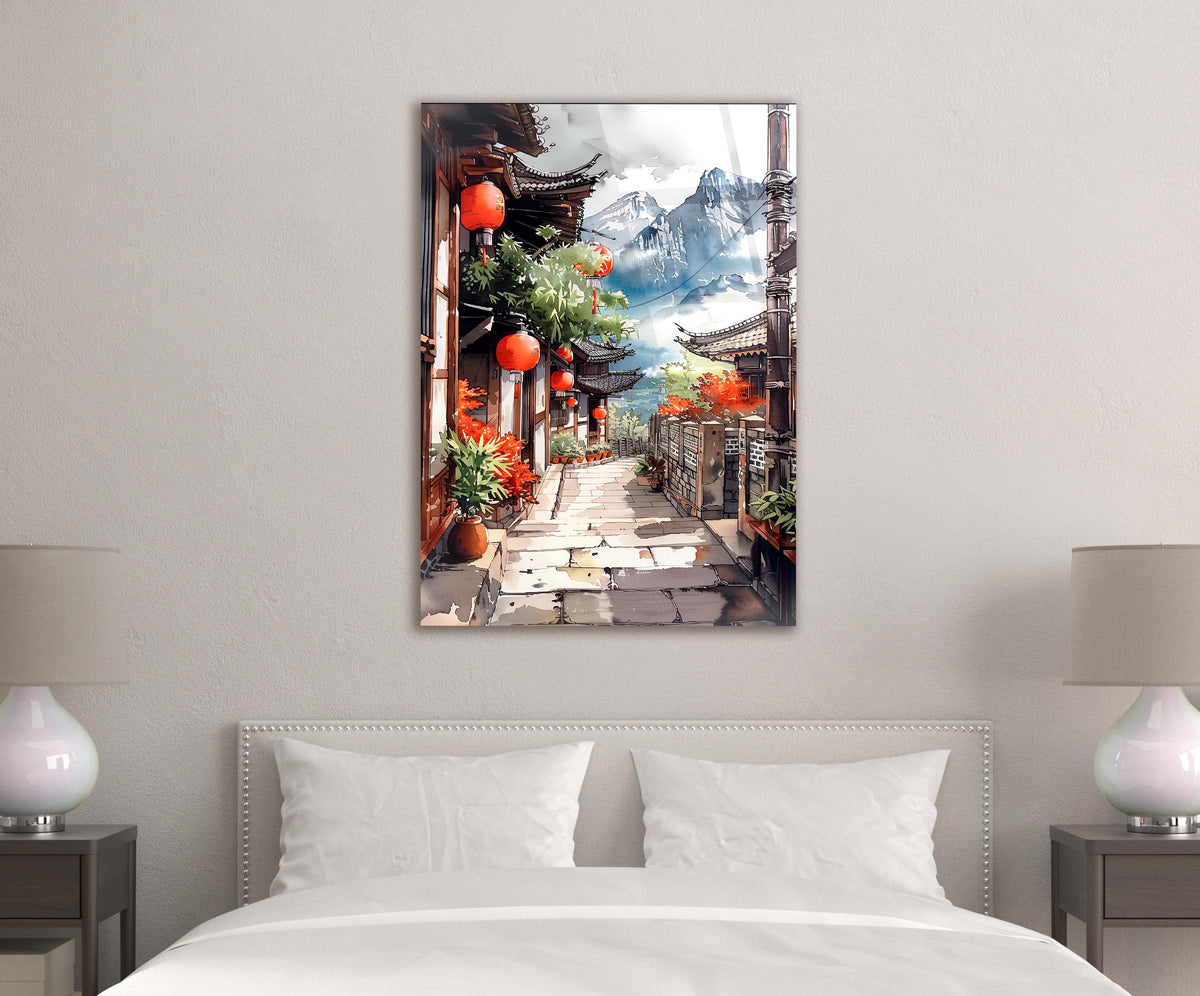 Mountain Village Lantern Alley Watercolor Glass Wall Art in a modern interior