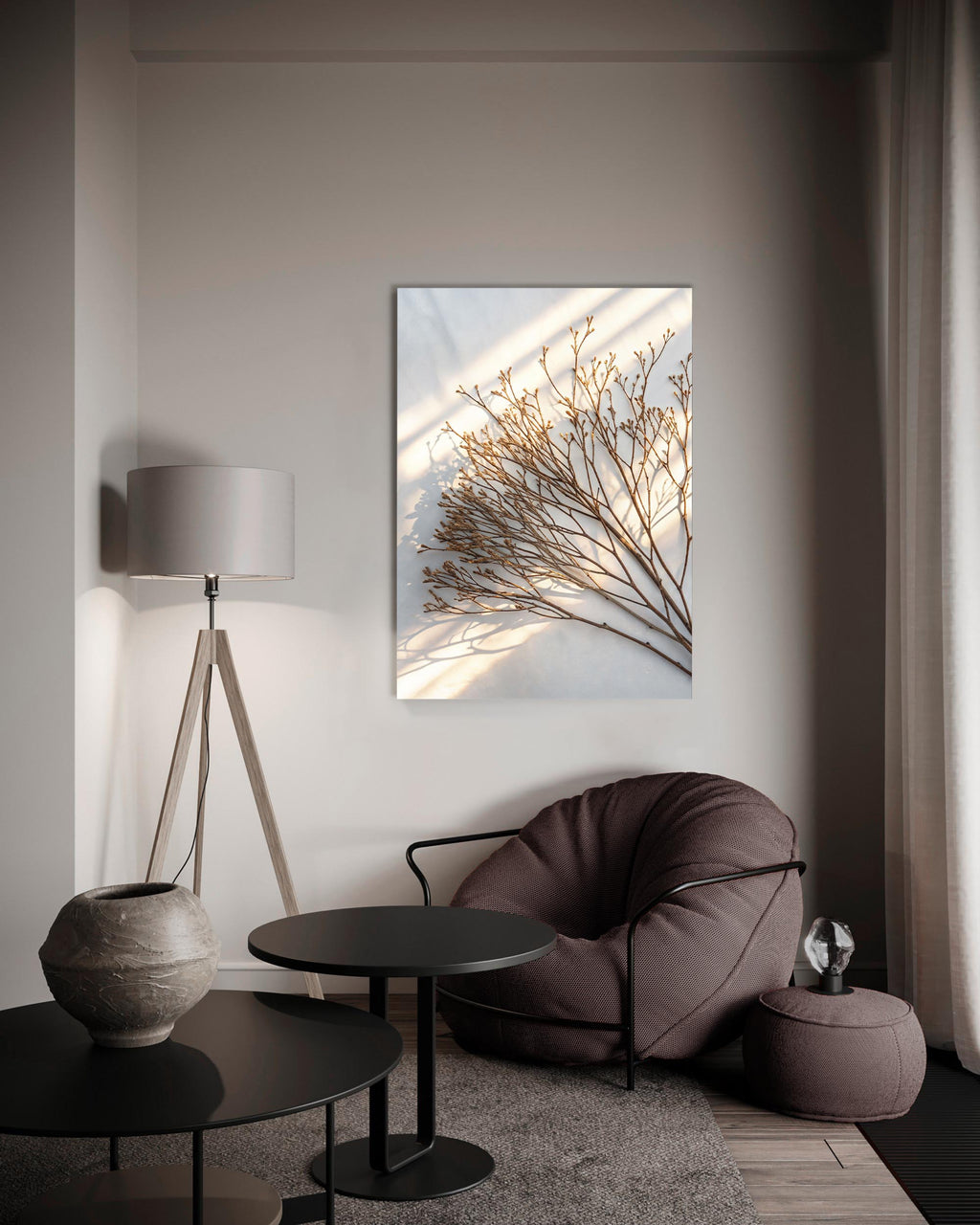 Dried Branch Shadow Minimalist Glass Wall Art in a living room interior