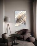 Dried Branch Shadow Minimalist Glass Wall Art in a living room interior