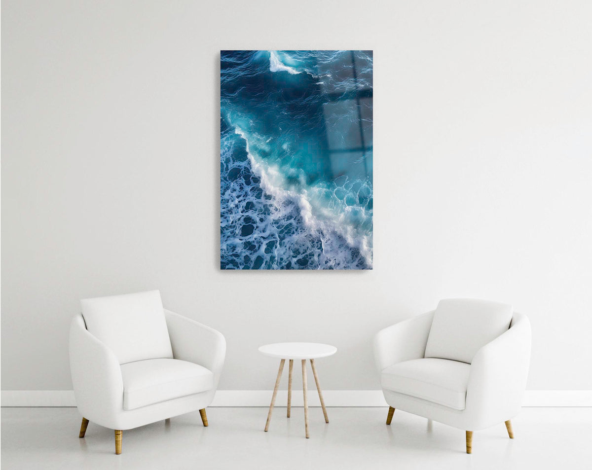 Turquoise Ocean Wave Aerial Glass Wall Art in a modern interior