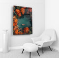 Aerial Autumn Lake with Rowboat Glass Wall Art in a living room interior
