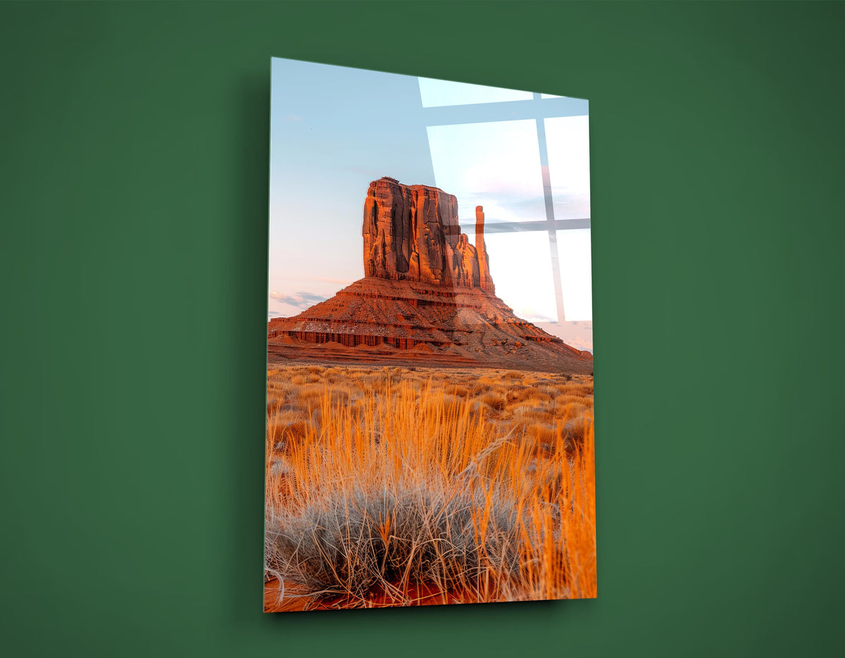 Desert Butte at Sunset Glass Wall Art on the wall