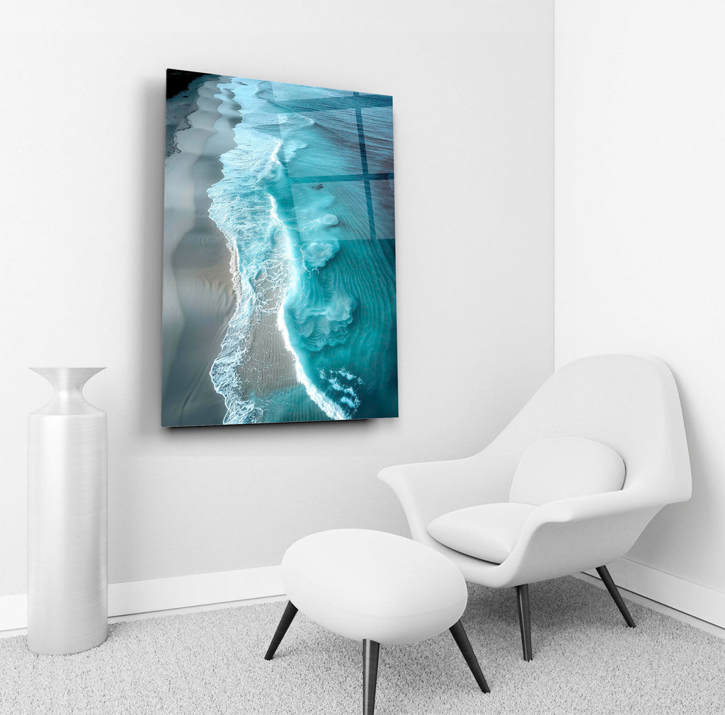 Aerial Turquoise Ocean Beach Glass Wall Art in a living room interior