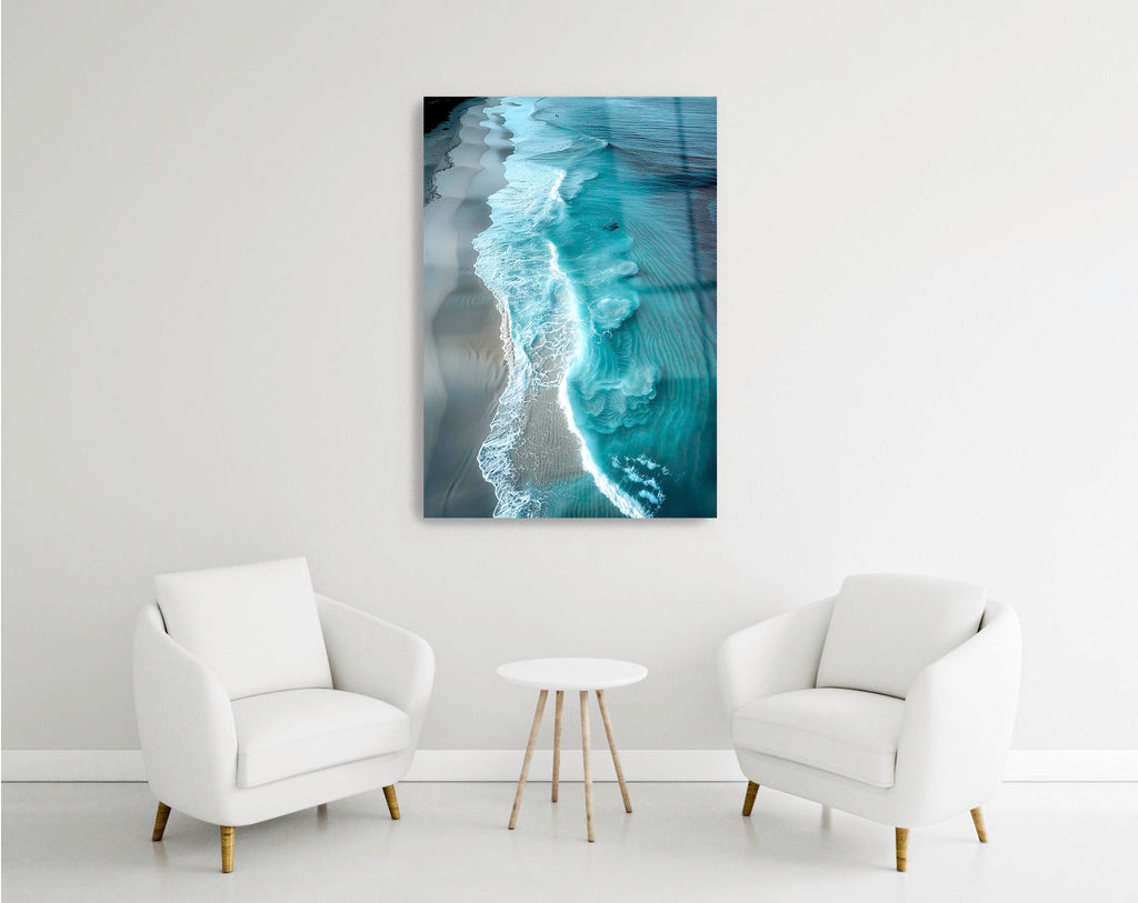 Aerial Turquoise Ocean Beach Glass Wall Art in a modern interior