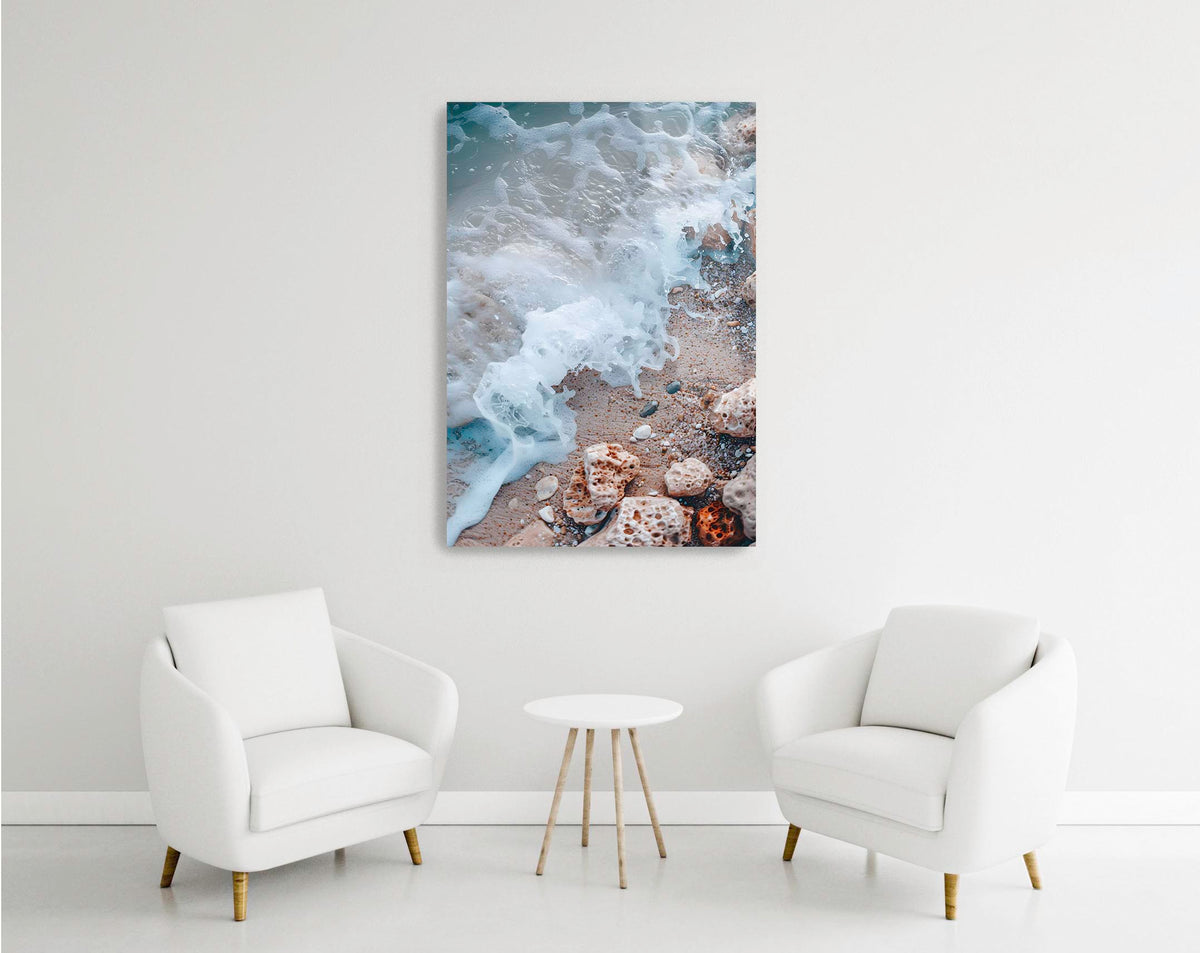 Sea Foam on a Pebble Beach Glass Wall Art in a modern interior