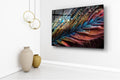 Iridescent Feather With Dew Drops Glass Wall Art in a living room interior