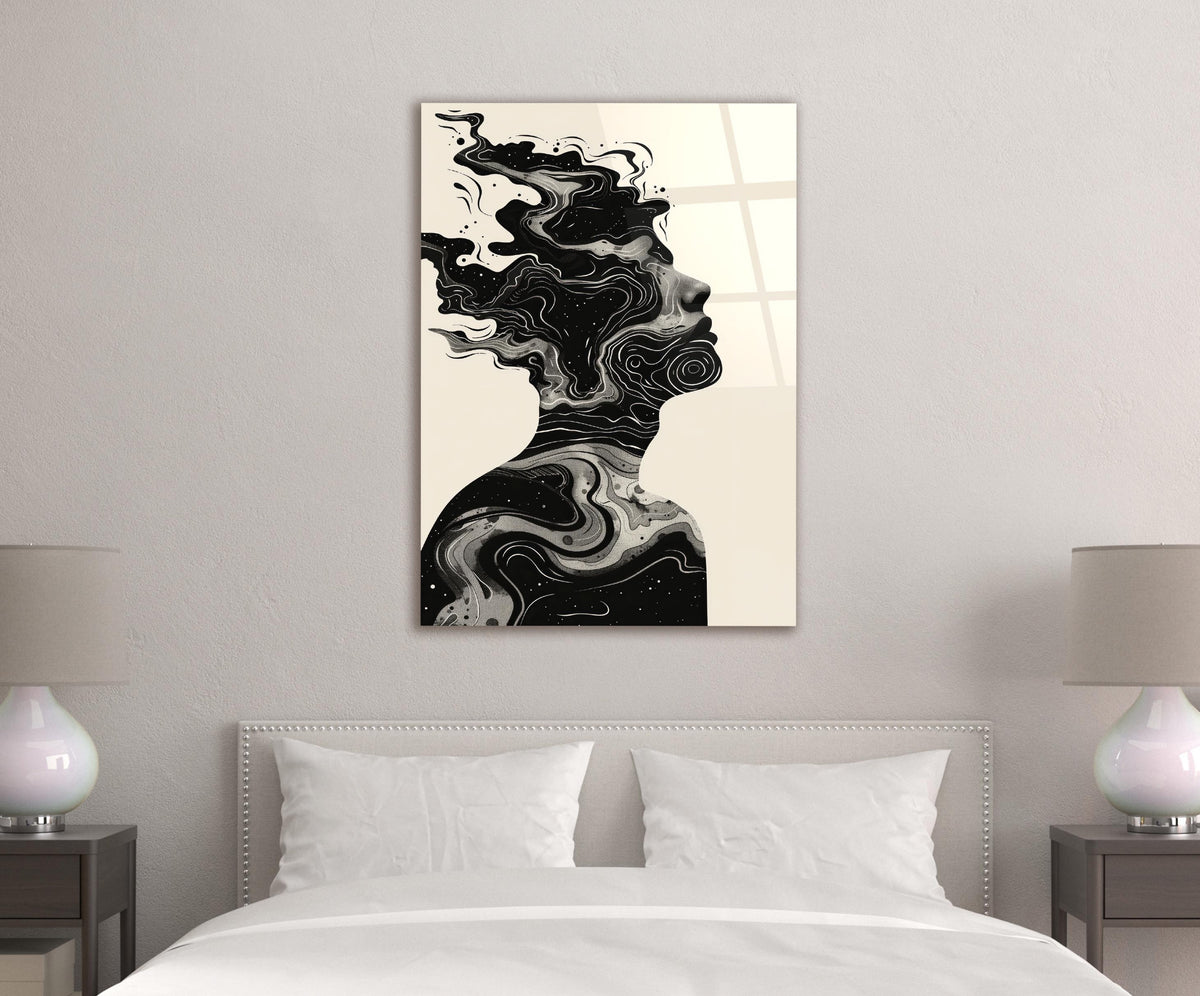 Swirling Ink Silhouette Glass Wall Art in a living room interior