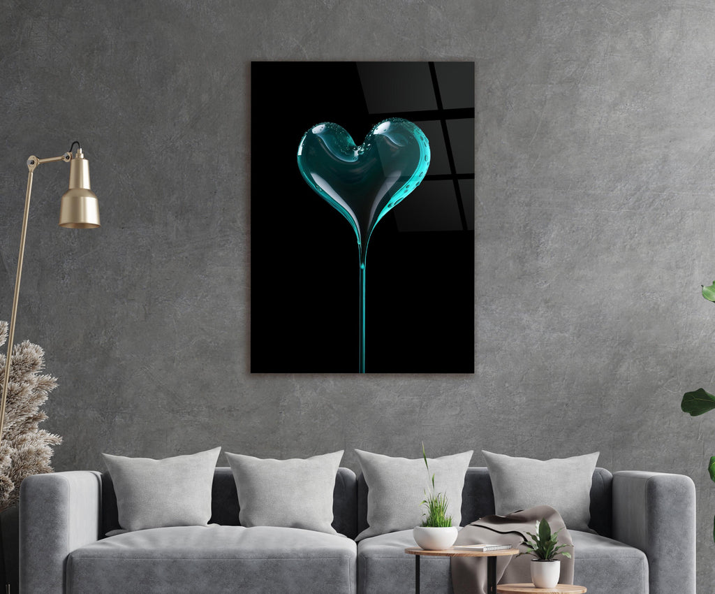Teal Glass Heart on Black Glass Wall Art in a living room interior