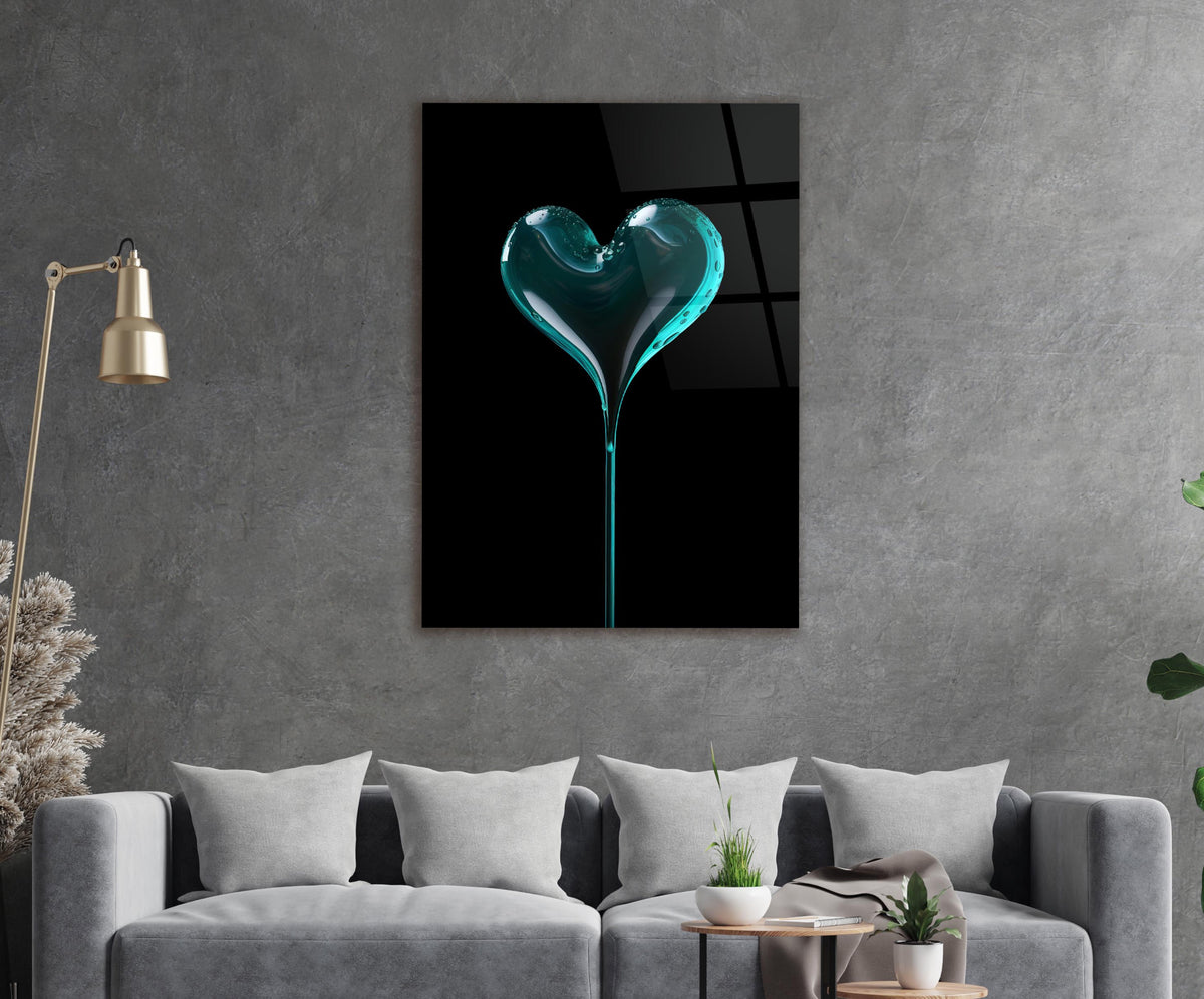 Teal Glass Heart on Black Glass Wall Art in a living room interior