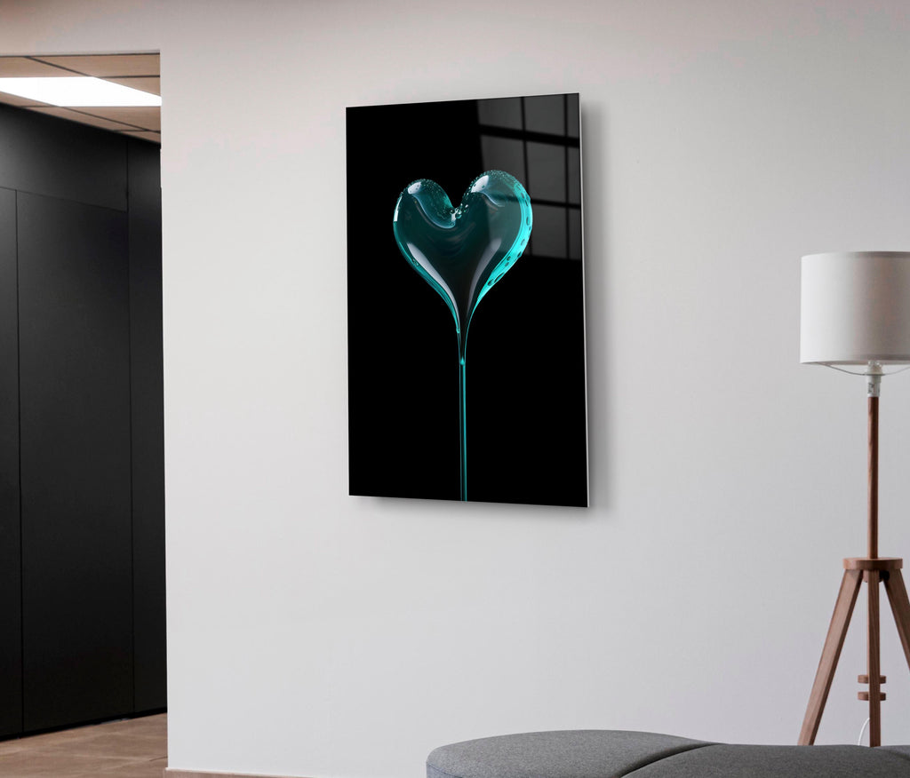 Teal Glass Heart on Black Glass Wall Art on the wall