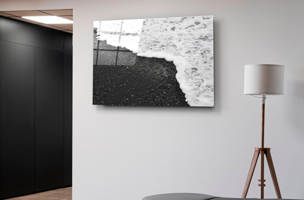 Black Sand Beach Waves Glass Wall Art on the wall