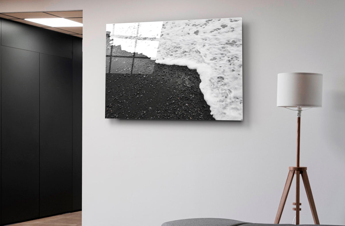 Black Sand Beach Waves Glass Wall Art on the wall