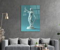 Lady Justice Statue Teal Glass Wall Art in a living room interior