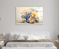 Cream and Blue 3D Floral Swirl Glass Wall Art in a living room interior