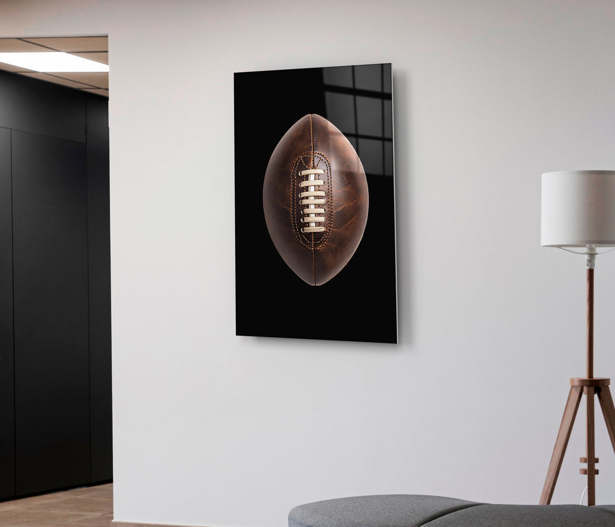Vintage Leather Football Glass Wall Art on the wall