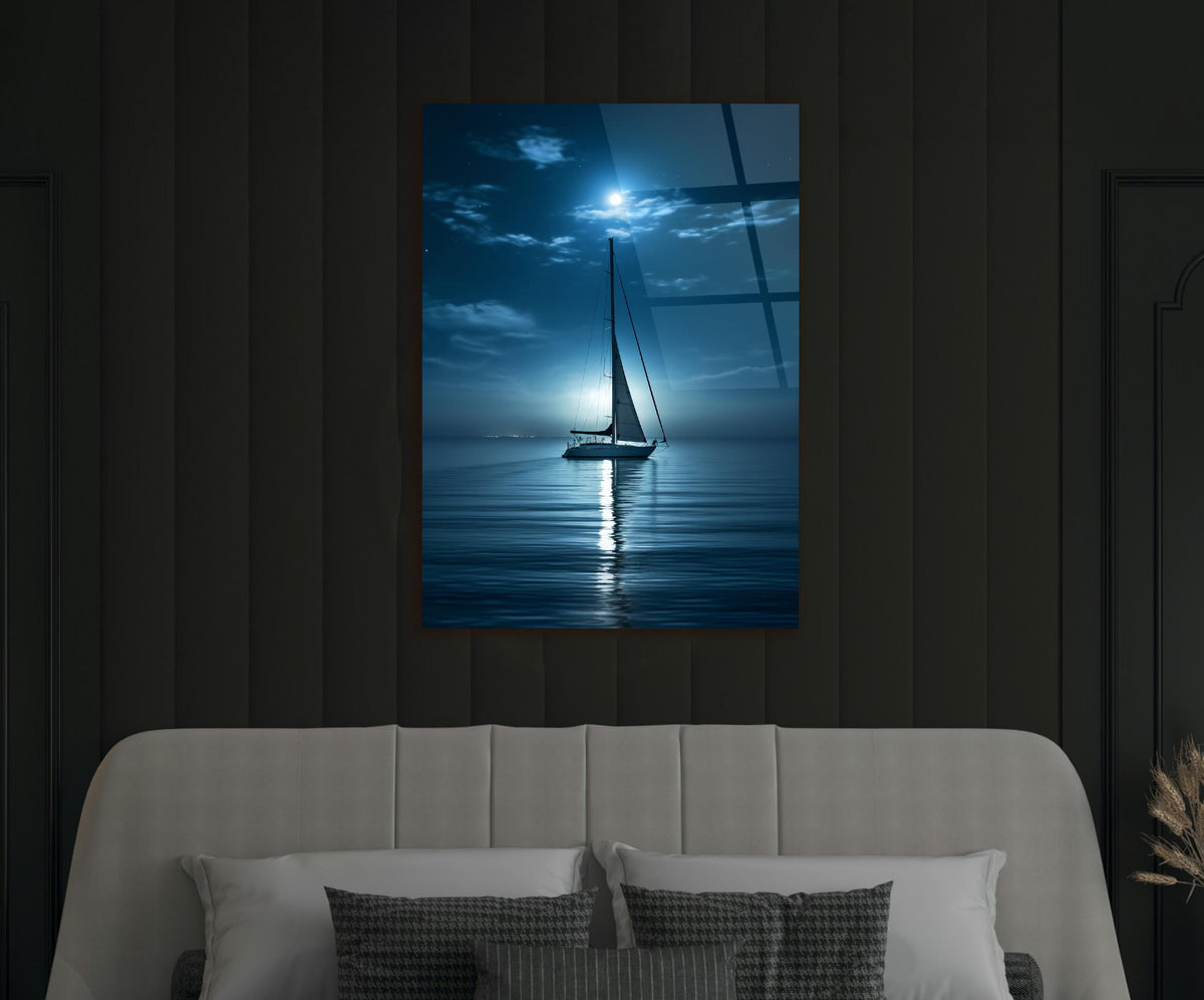 Moonlit Sailboat on Calm Sea Glass Wall Art in a living room interior