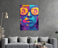 Pop Art Woman With Bitcoin Glasses Glass Wall Art in a living room interior