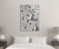 Miniature Skiers on Snowy Slope Glass Wall Art in a living room interior