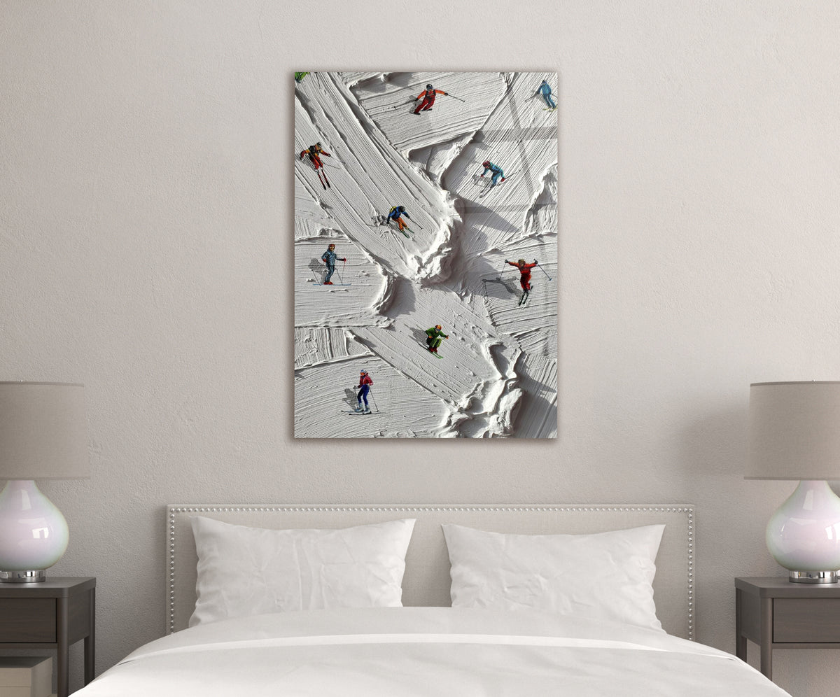 Miniature Skiers on Snowy Slope Glass Wall Art in a living room interior