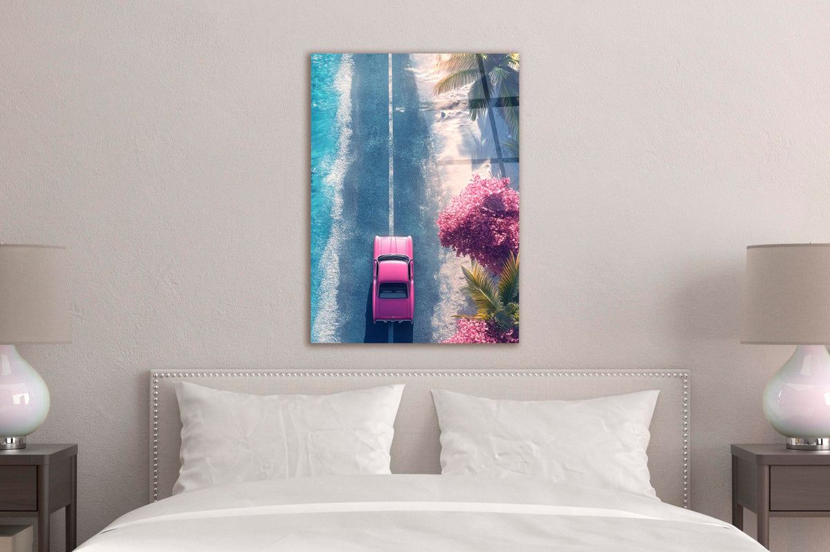 Pink Classic Car Coastal Road Aerial Glass Wall Art in a modern interior
