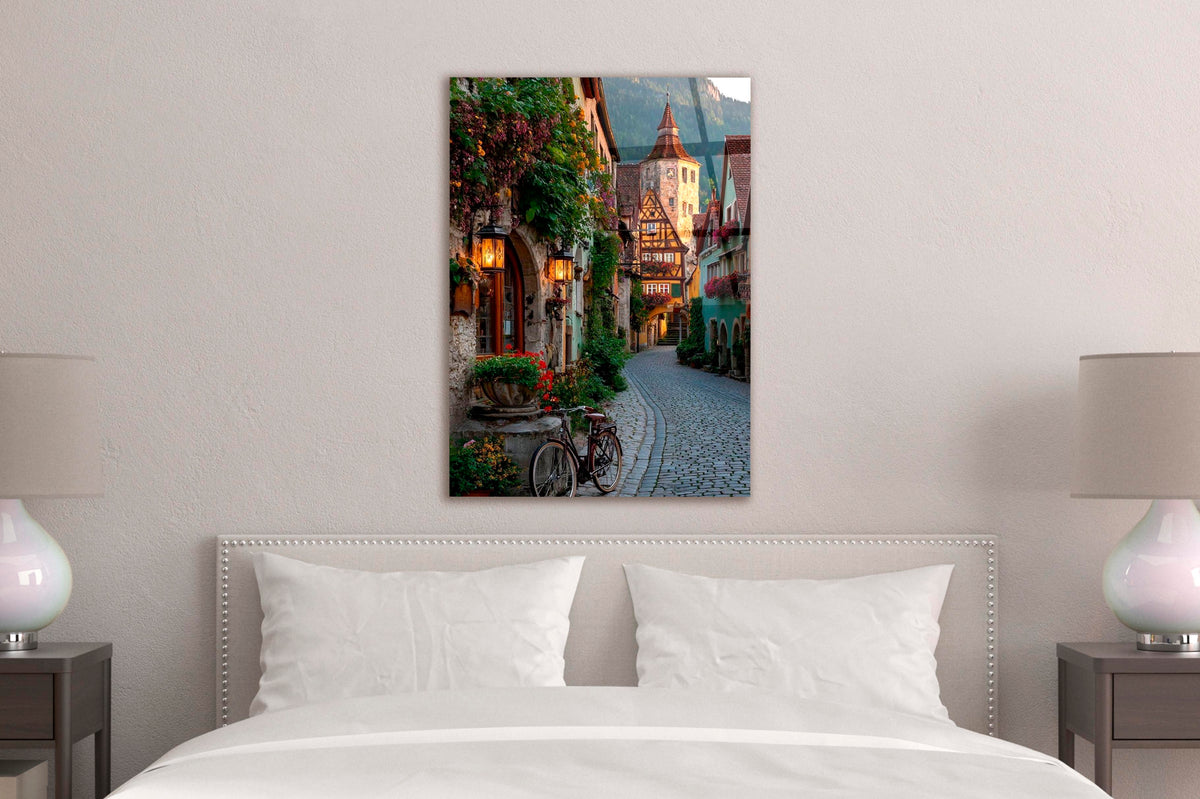 Lantern-Lit Old Town Alley Glass Wall Art in a modern interior