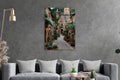 Medieval Stone Village Path Glass Wall Art in a living room interior