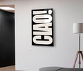Ciao Bold Typography Glass Wall Art in a living room interior