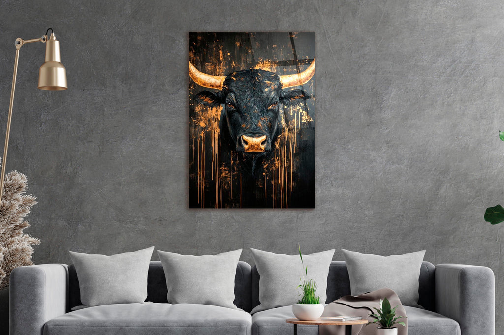 Black and Gold Bull Glass Wall Art on the wall
