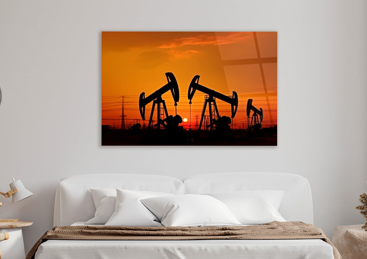 Oil Pumpjacks at Sunset Glass Wall Art in a living room interior