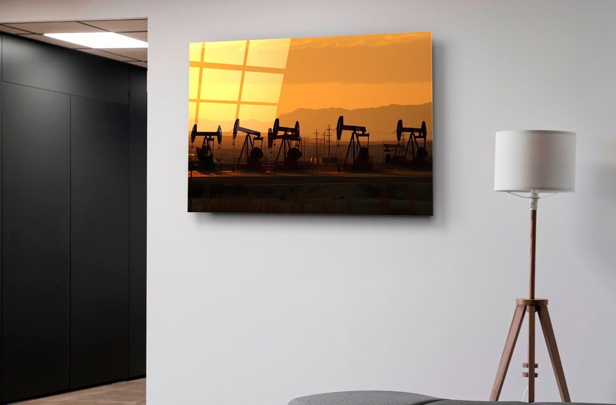 Oil Pumpjacks at Sunset Glass Wall Art on the wall