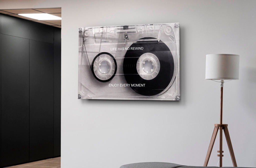 Life Has No Rewind Cassette Tape Glass Wall Art in a modern interior