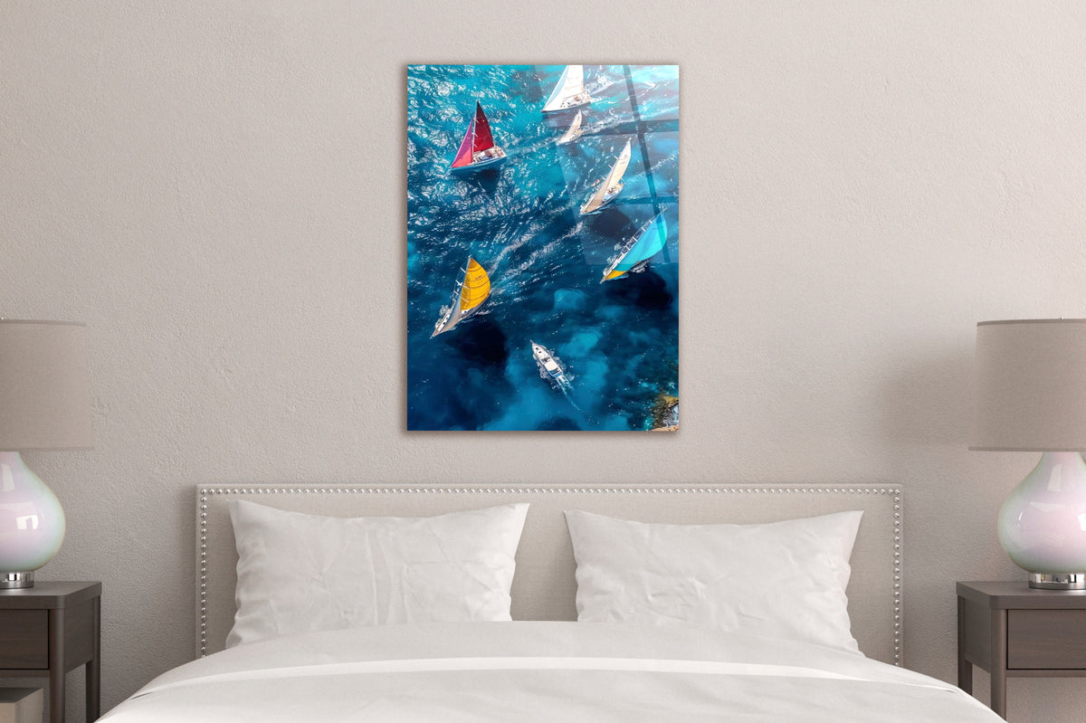 Sailboats on Blue Sea Aerial Glass Wall Art in a modern interior
